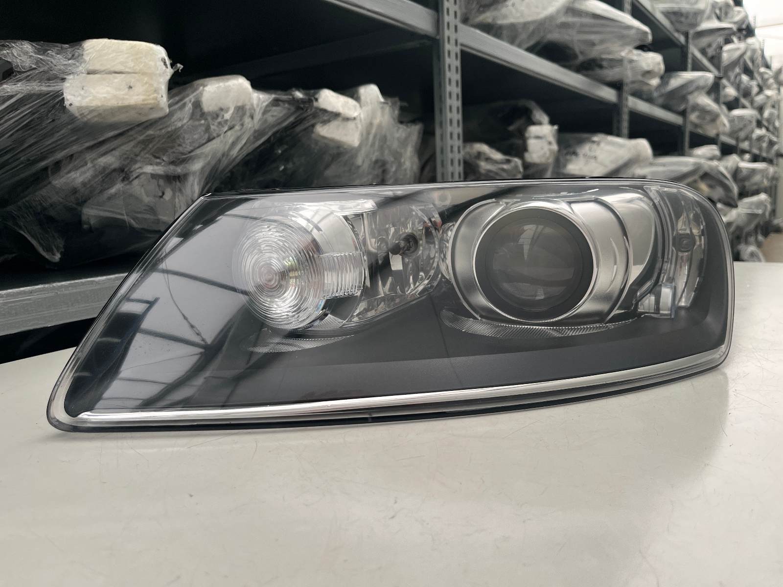 VW TOUAREG XENON KL SCHEINWERFER LINKS KPL  7L6941017